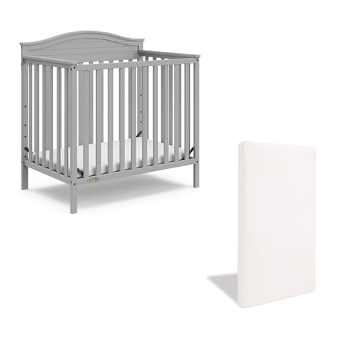 Graco Stella 4-in-1 Convertible Mini Crib with Bonus Mattress (Pebble Gray) – Includes Bonus 2.75 Inch Thick Mattress with Water-Resistant Cover, Converts to Twin Bed, Ideal Crib for Small Spaces